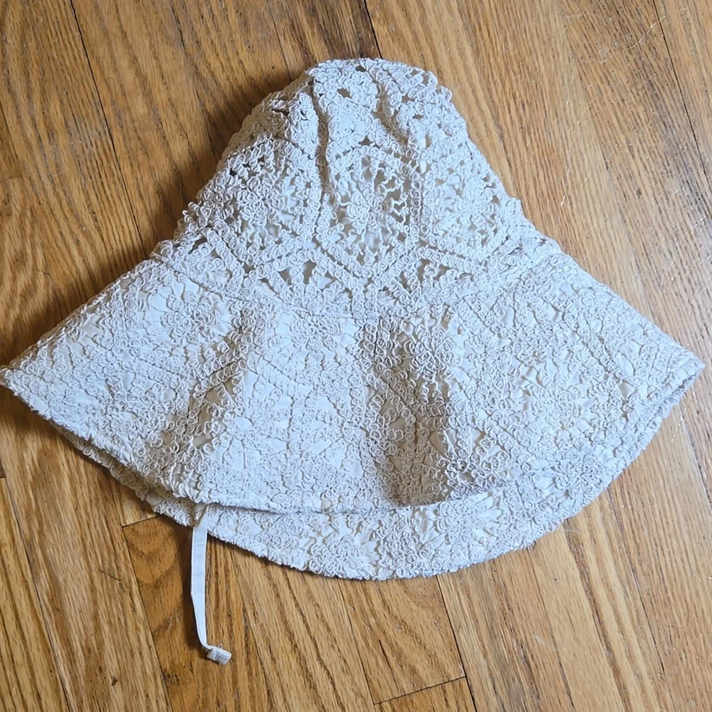 The Phluid Project cream boho crochet knit bucket hat